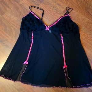 Sheer black with polkadot on top, pink edge